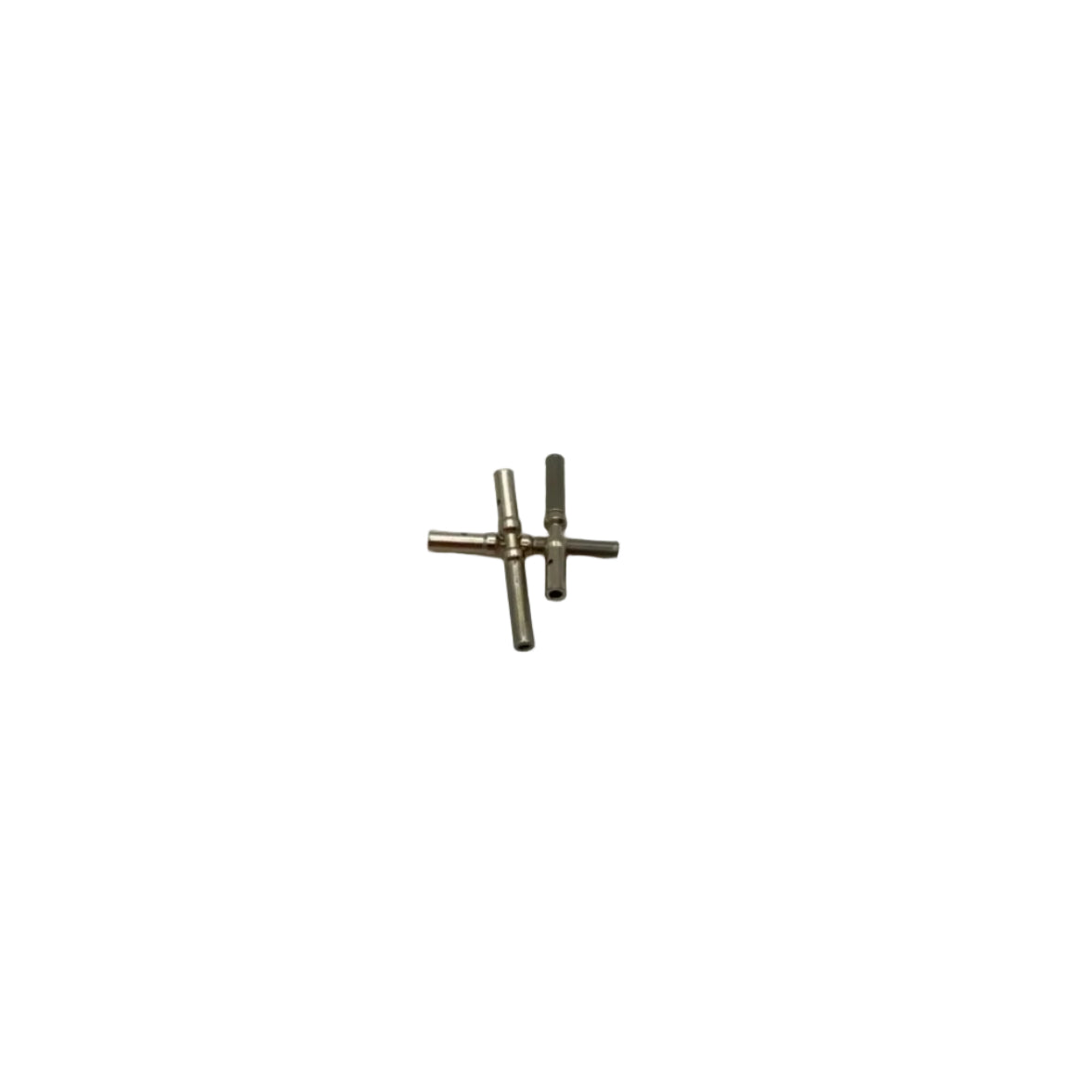 Three small metallic cylindrical pins or hardware pieces arranged in a loose cross shape on a plain light gray background.