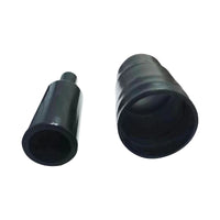 Two black rubber bushings on a white background