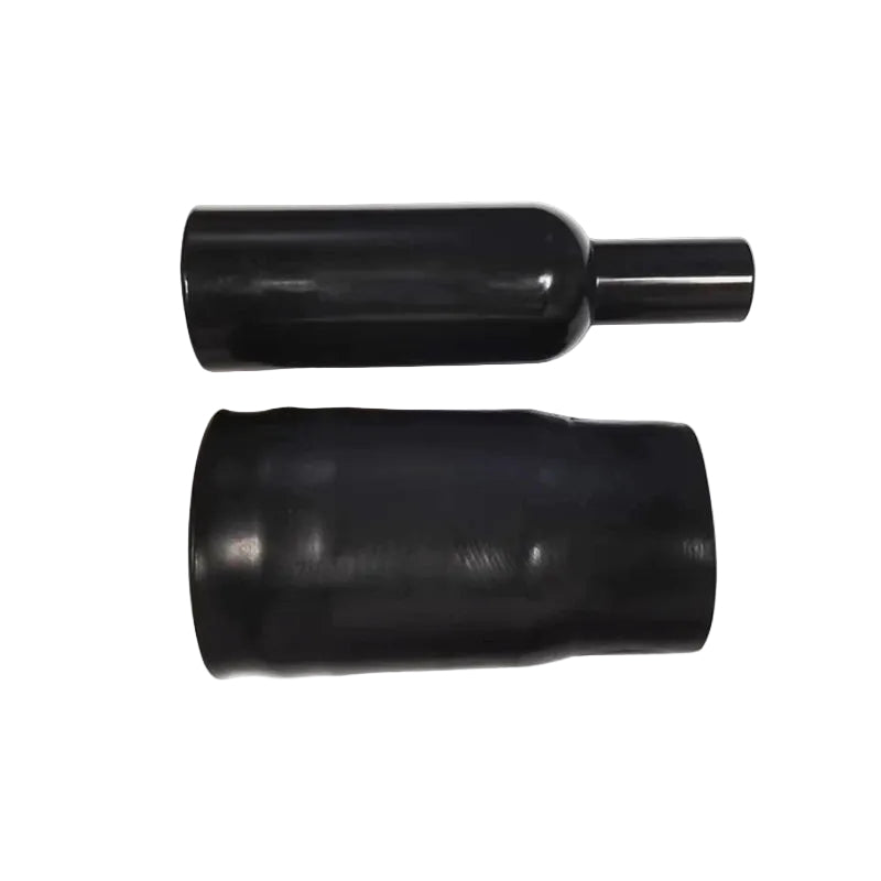 Two black cylindrical objects on a white background