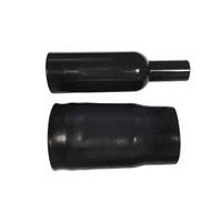 Two black cylindrical objects on a white background